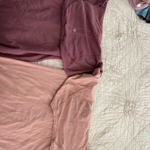 Two short sleeve lululemon scuba tops, size4.